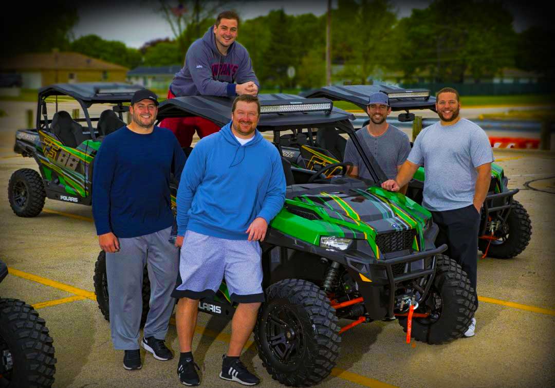 Football players with ATVs to his offensive line