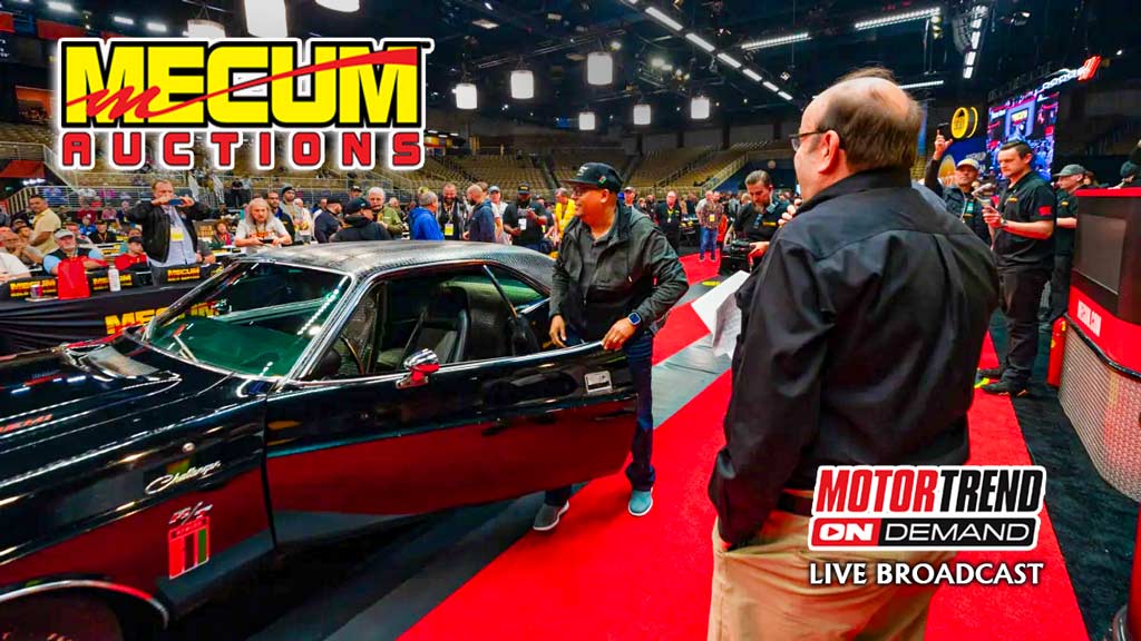 Mecum auction selling a black muscle car