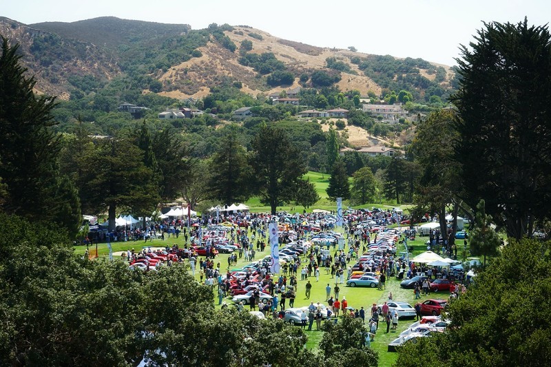 Join the Werks Reunion Monterey to celebrate over 800 new, vintage, and racing Porsches on the lush greens of the Monterey Pines Golf Course
