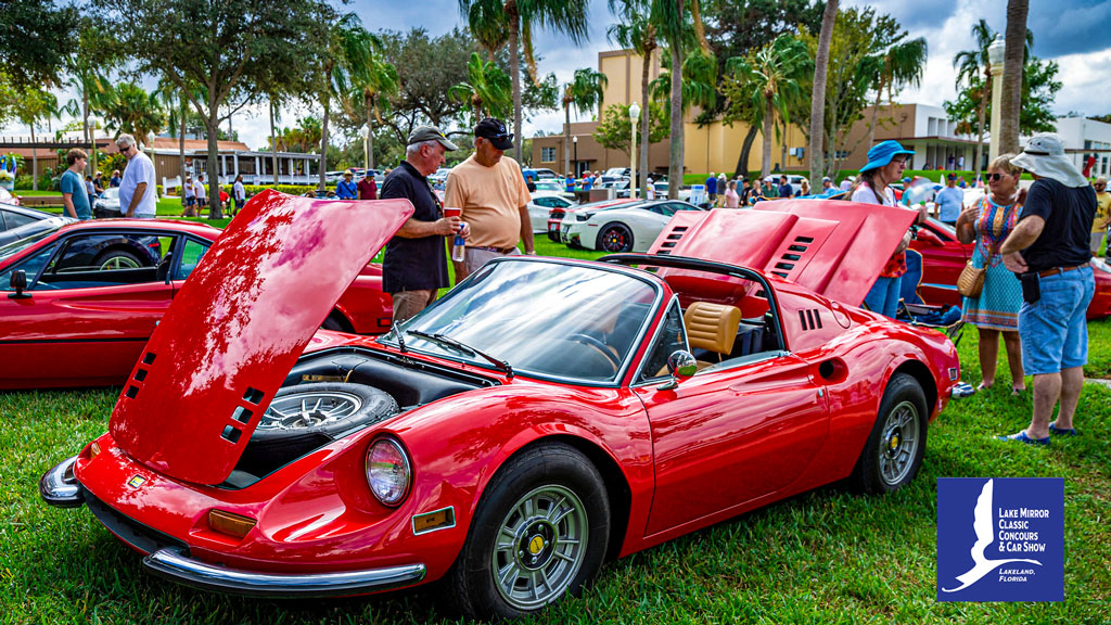 Car Collector looking a a Ferrari at the Lake Mirror Classic Concours d’Elegance and Car Show