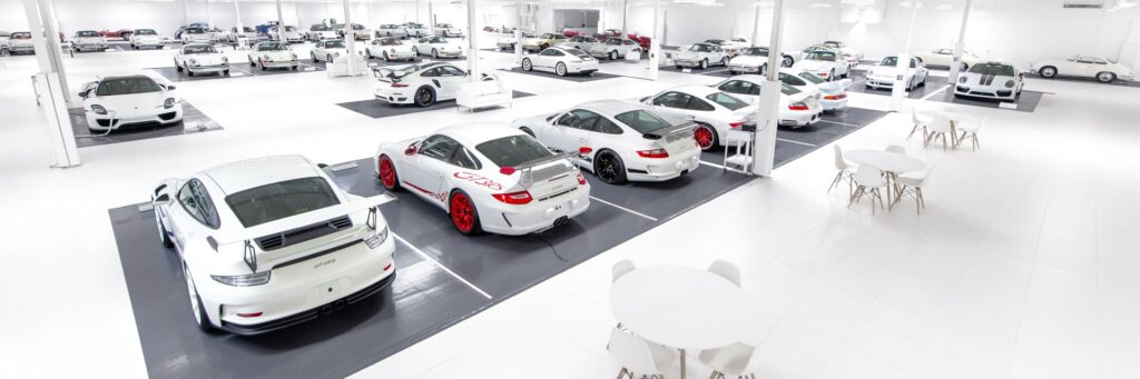 The White Car Collection of Porsche cars includes 63 motor vehicle lots in total, with 56 Porsche sports cars, 2 Porsche tractors, and over 500 lots of Porsche memorabilia.